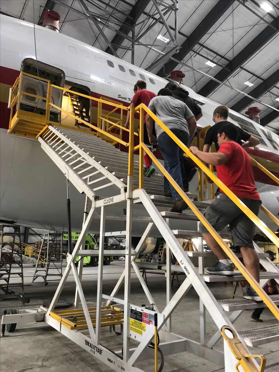 Students board plane at Kalitta tour